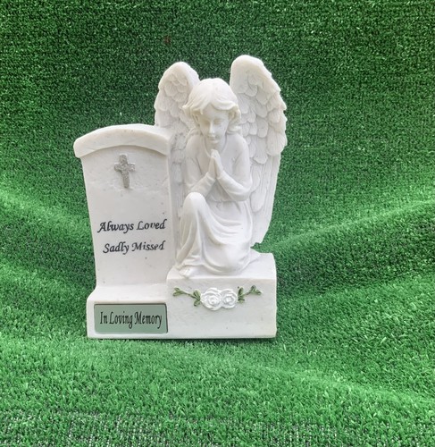 Angel headstone for in - by,